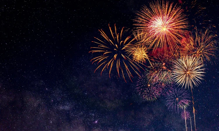 Red and gold fireworks lighting up the night sky